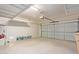 Garage with overhead storage and open door at 1713 W Morse Dr, Anthem, AZ 85086