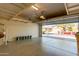 Garage with overhead storage and view of street at 1713 W Morse Dr, Anthem, AZ 85086