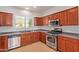 Modern kitchen with stainless steel appliances and ample cabinetry at 1713 W Morse Dr, Anthem, AZ 85086