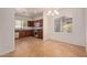 Kitchen with dark wood cabinets and stainless steel appliances at 1713 W Morse Dr, Anthem, AZ 85086