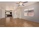 Open living room with tile floors and kitchen views at 1713 W Morse Dr, Anthem, AZ 85086