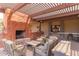 Outdoor patio with fireplace and comfortable seating at 1713 W Morse Dr, Anthem, AZ 85086