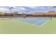 Two well-maintained tennis courts with mountain views at 1713 W Morse Dr, Anthem, AZ 85086