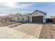 Modern home with a paver driveway and drought-tolerant landscaping at 2205 E Fallen Leaf Ln, Phoenix, AZ 85024