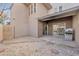 Backyard featuring desert landscaping, an enclosed patio, and a sliding glass door at 2533 W Hazelwood St # 3, Phoenix, AZ 85017