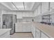 Eat-in kitchen features ample counter space, modern stainless steel appliances, and bright lighting at 2533 W Hazelwood St # 3, Phoenix, AZ 85017