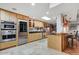 Modern kitchen with stainless steel appliances and light wood cabinetry at 2631 E Beekman Pl, Phoenix, AZ 85016