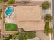 Aerial view of a home featuring a private backyard with a pool and green space at 3241 E Aris Dr, Gilbert, AZ 85298