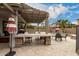 Outdoor backyard with a built-in barbeque, outdoor seating and dining areas, perfect for entertaining at 3241 E Aris Dr, Gilbert, AZ 85298