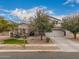 Charming two-story home showcasing mature trees and well-maintained landscaping at 3241 E Aris Dr, Gilbert, AZ 85298
