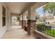 Spacious front porch with stone accents, providing a welcoming and shaded entrance to the home at 3241 E Aris Dr, Gilbert, AZ 85298