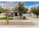 Charming two-story home with well-maintained landscaping, a two-car garage, and welcoming front porch at 3241 E Aris Dr, Gilbert, AZ 85298