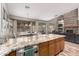 Open concept kitchen featuring granite counters, island, and breakfast area at 3241 E Aris Dr, Gilbert, AZ 85298