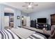 Spacious main bedroom with attached bathroom and view of the laundry room at 3241 E Aris Dr, Gilbert, AZ 85298