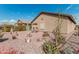 Backyard oasis with desert landscaping and patio at 514 S 224Th Dr, Buckeye, AZ 85326