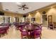 Community room with tables and chairs for gatherings at 514 S 224Th Dr, Buckeye, AZ 85326