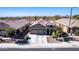 Beautiful single-Gathering home boasts a well-manicured yard and a spacious three-car garage at 514 S 224Th Dr, Buckeye, AZ 85326