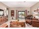 Spacious living area with sliding glass doors to backyard at 514 S 224Th Dr, Buckeye, AZ 85326