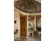 Elegant entryway with a unique chandelier and brick dome ceiling at 5526 E Roadrunner Rd, Paradise Valley, AZ 85253