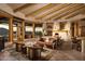 Bright living area with high ceilings, a large fireplace, and scenic views at 5526 E Roadrunner Rd, Paradise Valley, AZ 85253