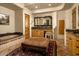 Beautiful bathroom features granite counters, an ottoman, designer mirrors, and a relaxing spa tub at 5526 E Roadrunner Rd, Paradise Valley, AZ 85253