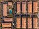 Aerial perspective of multiple residential buildings and a central pool at 5550 N 16Th St # 102, Phoenix, AZ 85016