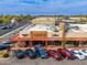 Aerial view of a commercial building with ample parking at 5550 N 16Th St # 102, Phoenix, AZ 85016
