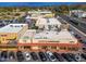 Aerial perspective of a shopping center with various stores and parking at 5550 N 16Th St # 102, Phoenix, AZ 85016