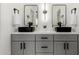 Modern bathroom with gray cabinets and black sinks at 5550 N 16Th St # 102, Phoenix, AZ 85016