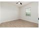 Bright bedroom with wood-look flooring and window coverings at 5550 N 16Th St # 102, Phoenix, AZ 85016