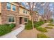 Attractive townhome with stone facade and landscaped walkway at 5550 N 16Th St # 102, Phoenix, AZ 85016