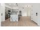 Modern kitchen with gray cabinets, marble island, and stainless steel appliances at 5550 N 16Th St # 102, Phoenix, AZ 85016