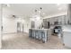Modern kitchen with gray cabinets, marble island, and stainless steel appliances at 5550 N 16Th St # 102, Phoenix, AZ 85016