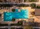 Overhead view of refreshing community pool with spa and lounge area at 5550 N 16Th St # 102, Phoenix, AZ 85016