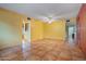 Bright living room with tile floors and ceiling fan at 9421 N 50Th Dr, Glendale, AZ 85302