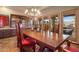 Bright dining room with access to the outdoor patio at 9950 E Sundance Trl, Scottsdale, AZ 85262