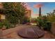 Relax in the luxurious hot tub, nestled in a beautifully landscaped patio area at 9950 E Sundance Trl, Scottsdale, AZ 85262