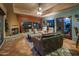 Cozy living room with fireplace and comfortable seating at 9950 E Sundance Trl, Scottsdale, AZ 85262