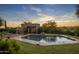 Relaxing pool and patio area with sunset views at 9950 E Sundance Trl, Scottsdale, AZ 85262