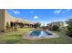 Stunning kidney-shaped pool with grassy backyard at 9950 E Sundance Trl, Scottsdale, AZ 85262