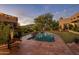 Inviting backyard pool with string lights and a relaxing patio at 9950 E Sundance Trl, Scottsdale, AZ 85262