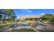 Inviting pool and patio area with a large stone feature at 9950 E Sundance Trl, Scottsdale, AZ 85262