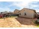 View of home's back and backyard with gazebo at 10436 W Payson Rd, Tolleson, AZ 85353