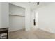 Spacious bedroom closet with shelves and hanging rod at 10838 W Buchanan St, Avondale, AZ 85323