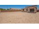 View of spacious backyard and exterior of the home at 12362 W Marguerite Ave, Avondale, AZ 85323