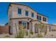 Charming two-story home with desert landscaping, a tile roof, and decorative shutters at 12362 W Marguerite Ave, Avondale, AZ 85323