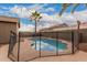 Inviting swimming pool with safety fence at 12739 W Merrell St, Avondale, AZ 85392