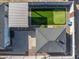 This aerial view showcases the property with a putting green and detached garage at 1618 W Culver St, Phoenix, AZ 85007