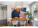 Dining room showcasing stylish lighting fixture, modern decor and hardwood floors at 1618 W Culver St, Phoenix, AZ 85007