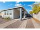 Stylish exterior of the home featuring a well-maintained yard and inviting entryway at 1618 W Culver St, Phoenix, AZ 85007